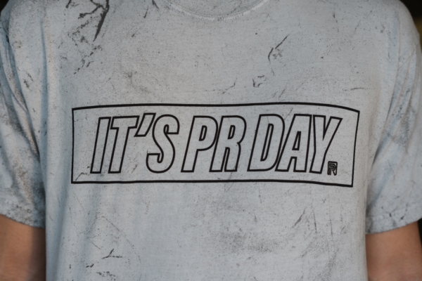 IT’S PR DAY tee front close up